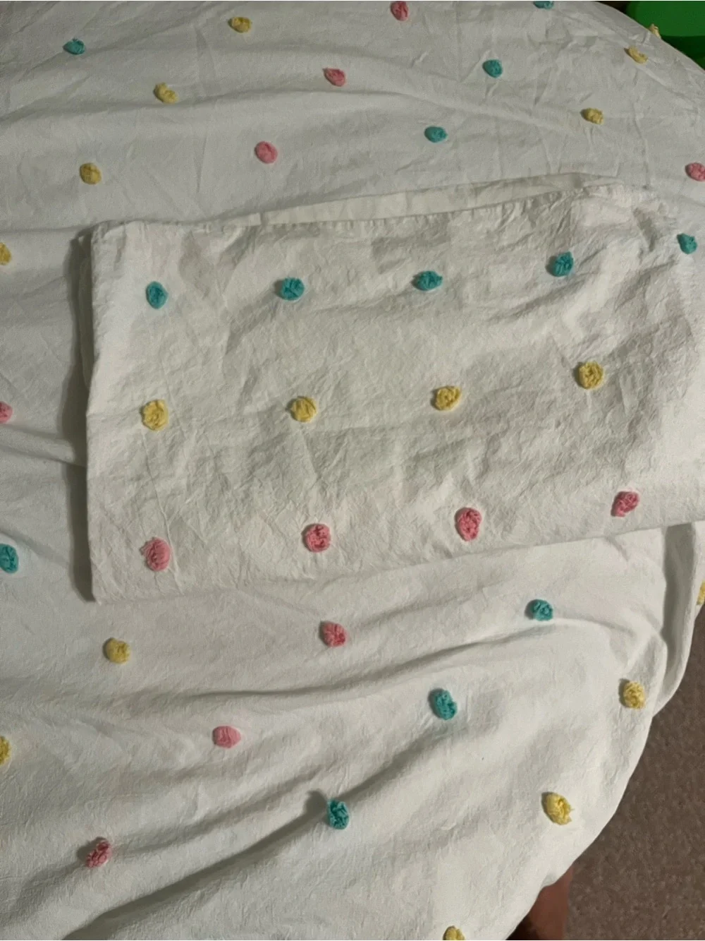 White comforter with Pink, Yellow, and Teal Dot Tufts